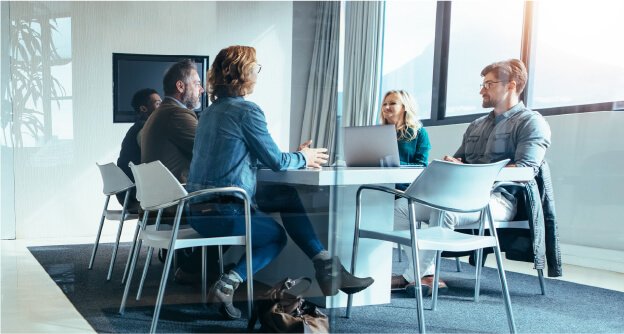 team in a board room meeting